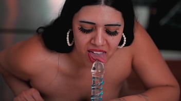 Latina slut shows photographer how she sucks glass cock