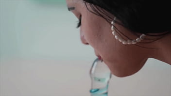 Latina slut shows photographer how she sucks glass cock