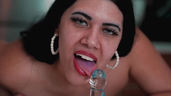 Latina slut shows photographer how she sucks glass cock