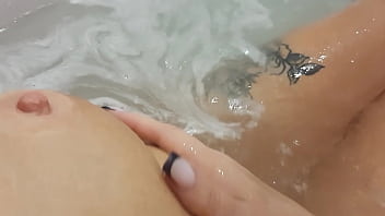 Pretty woman masturbates in a hot tub cumshot bright and loud watch to the end