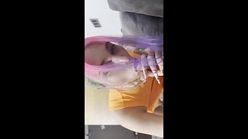 Sexy roxy with colored hair passionately swallows lover's penis