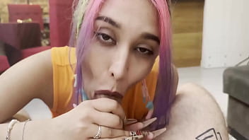 Sexy roxy with colored hair passionately swallows lover's penis