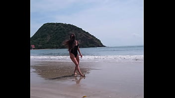 Black bikini and passionate flashing on the beach