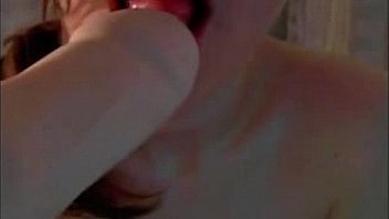 Cute redhead sucks dildo on webcam