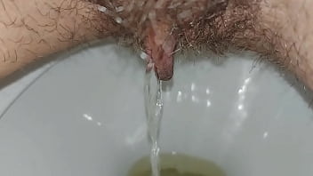 Hairy pussy pissing close up