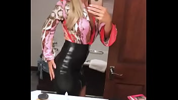 Sexy girl in leather skirt showing off
