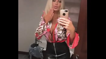 Sexy girl in leather skirt showing off