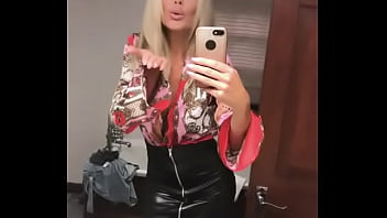 Sexy girl in leather skirt showing off