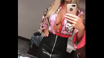 Sexy girl in leather skirt showing off