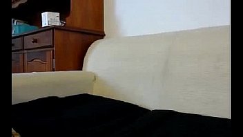 Skinny brunette sucks a dildo like a cock