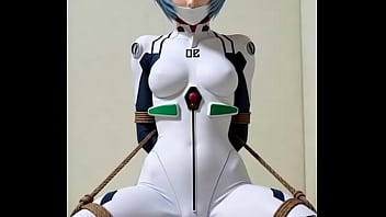 Rei bounded by rope in bedroom rubbing against a pillow