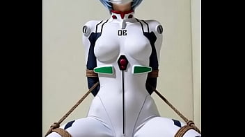 Rei bounded by rope in bedroom rubbing against a pillow