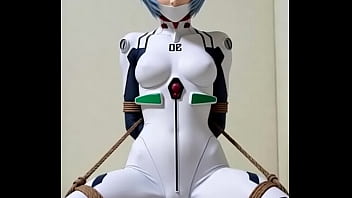 Rei bounded by rope in bedroom rubbing against a pillow