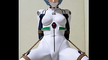 Rei bounded by rope in bedroom rubbing against a pillow