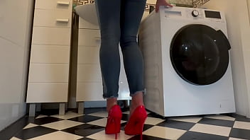 Wetting extremely jeans and red classic high heels and play with pee