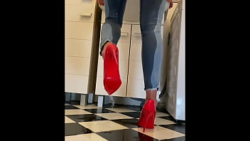 Wetting extremely jeans and red classic high heels and play with pee