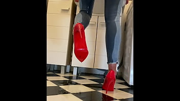 Wetting extremely jeans and red classic high heels and play with pee