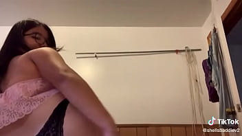 Asian slut teasing and stripping