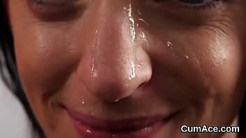 Frisky hottie gets cumshot on her face sucking all the cream