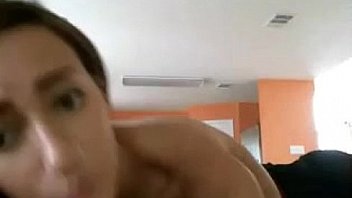 Brownhaired Girl Curled Up On Chair Bating thumbnail