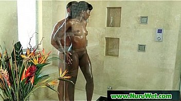 Horny client gets a nuru gel massage from sexy babe 12