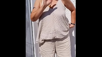 Flopping her tits out outdoors