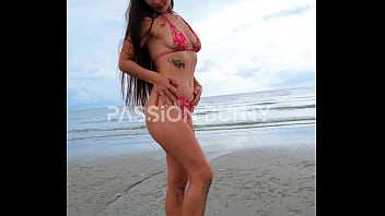 Bikini walking on the beach with sexy hottie