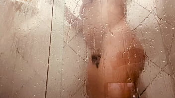 Milf filming herself washing her hairy pussy in the bathroom