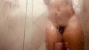 Milf filming herself washing her hairy pussy in the bathroom