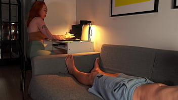 Nerdy redhead reveals tits while sucking cock