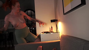 Nerdy redhead reveals tits while sucking cock