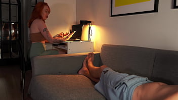 Nerdy redhead reveals tits while sucking cock