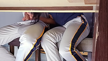 Forbidden hot student teasing and touching under the table