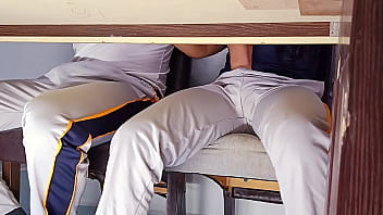Forbidden hot student teasing and touching under the table