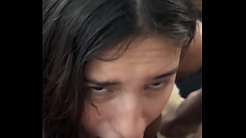 Horny brunette sucking dick backstage