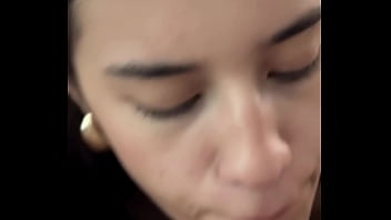 Horny brunette sucking dick backstage