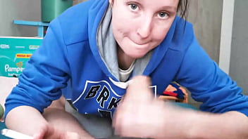 Brunette in hoodie sucking cock