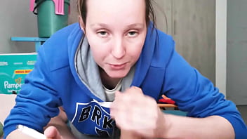 Brunette in hoodie sucking cock