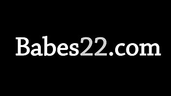 Delicate blonde on the black couch