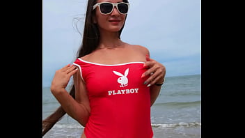 Dancing and chilling on the beach in sexy bikini