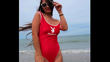 Dancing and chilling on the beach in sexy bikini