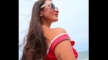 Dancing and chilling on the beach in sexy bikini