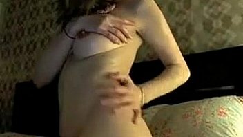 Beautiful girl does a striptease