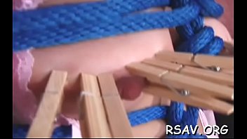 Cute gal endures sadomasochism