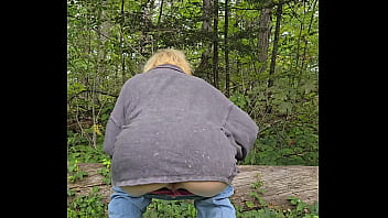 Wife pisses while walking at the park