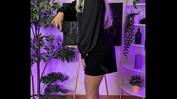 Sexy milf putting on leather harness suit