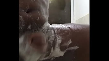 Horny bottom masturbation in the shower
