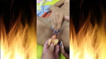 Enjoying his friend's toy and fingers