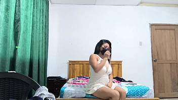 The busty executive chooses a white dress and then starts making sensual movements showing her beautiful vagina