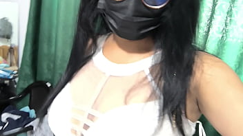 The busty executive chooses a white dress and then starts making sensual movements showing her beautiful vagina